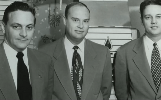 black and white photo of 3 men